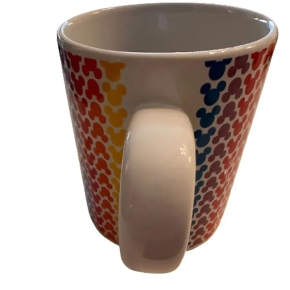 Disney Mickey Mouse Rainbow mug 14 oz. Small silhouettes of Mickey Mouse’s Head